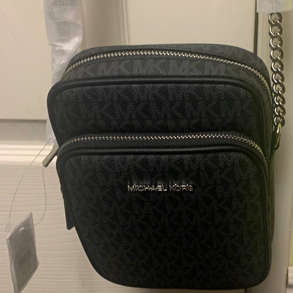 Michael Kors Handbags - Michael Kors Cream and Gold Monogram Backpack